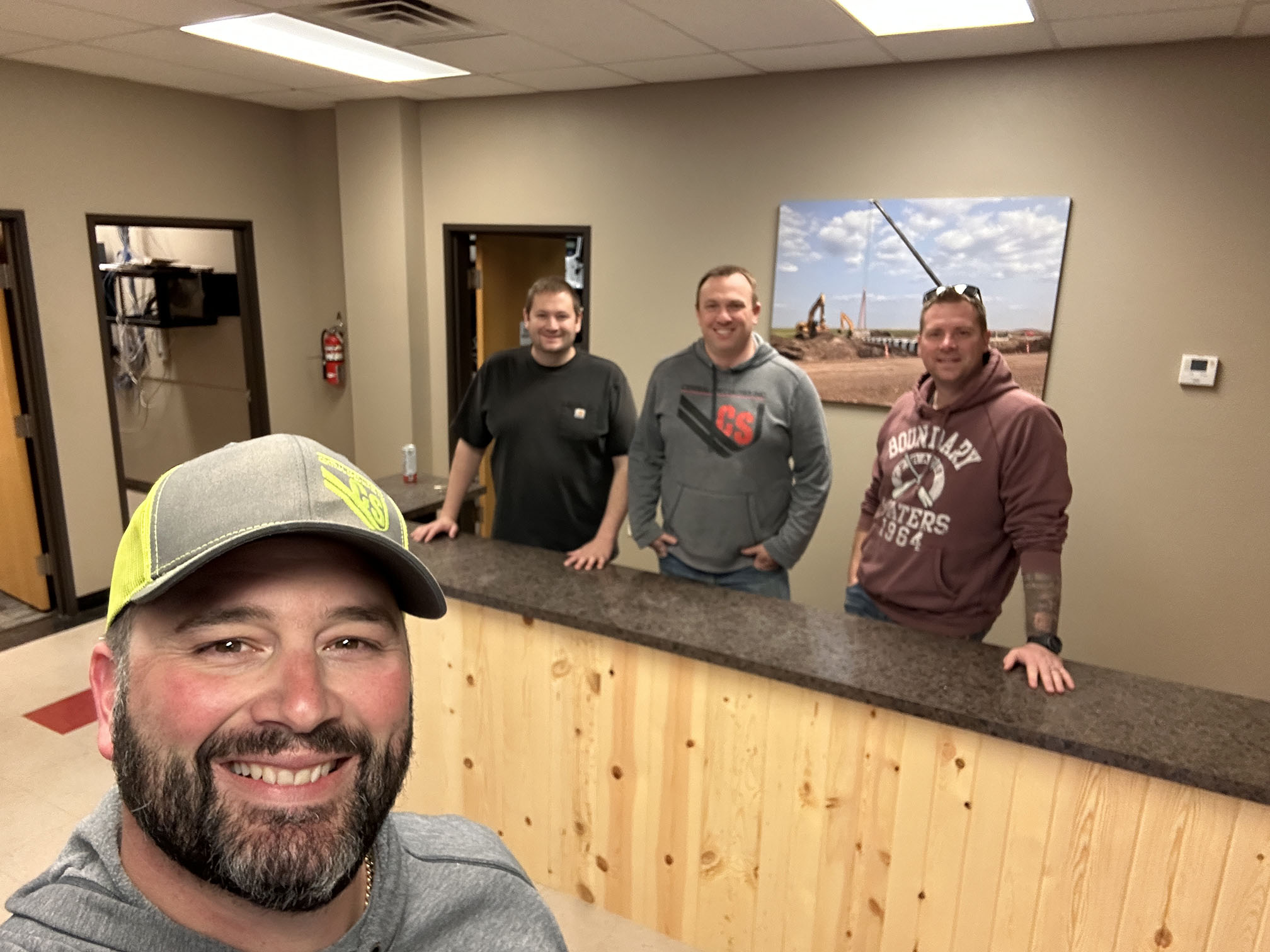 central specialties interior building office area with team in watford city nd