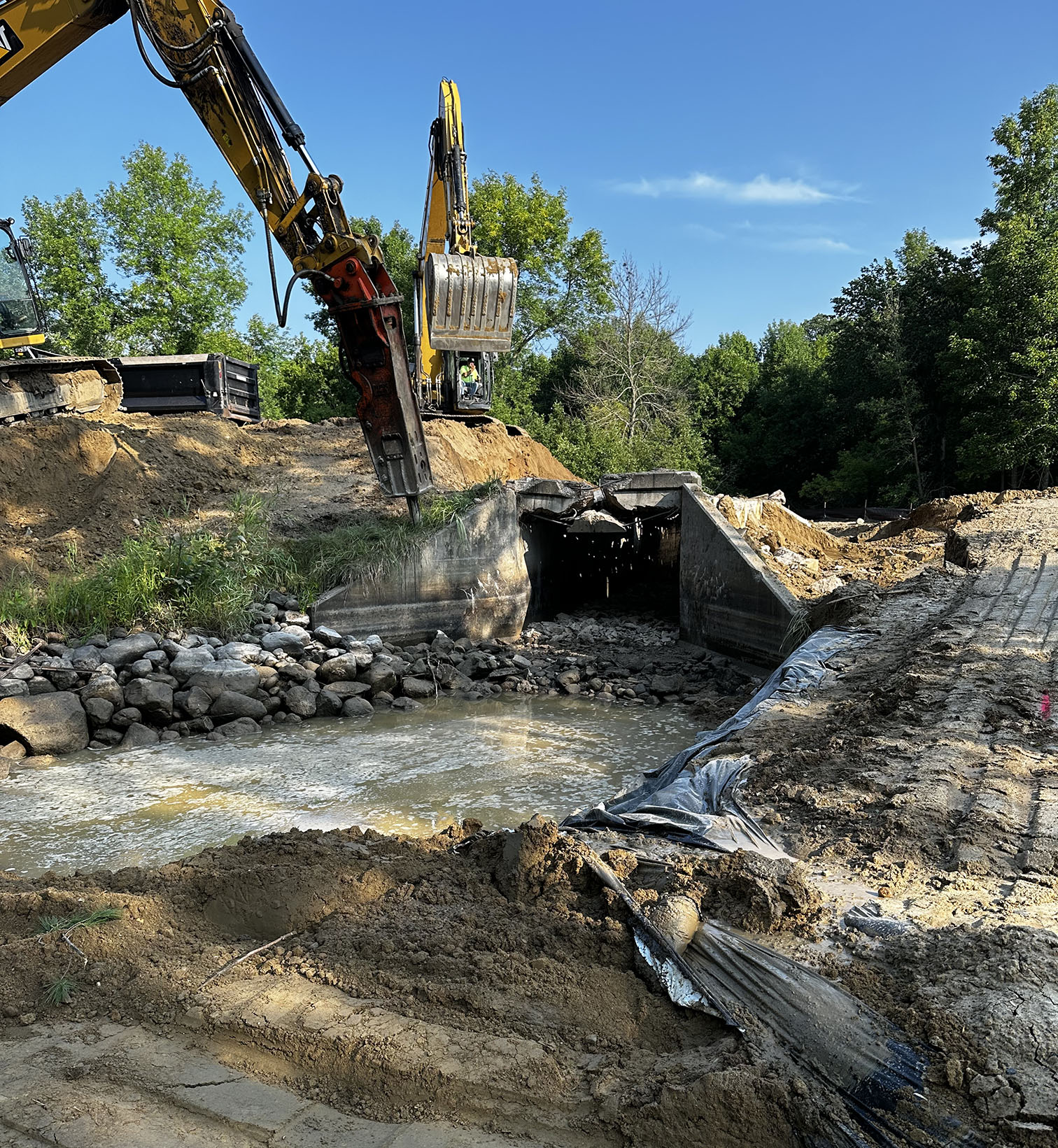 csi crew works on bridge project and water diversion